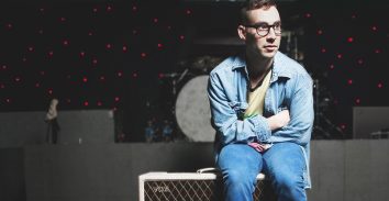 artist, Jack Antonoff, sitting on VOX amplifier